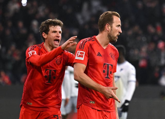 Soccer Football - Bundesliga - Bayern Munich v TSG 1899 Hoffenheim - Allianz Arena, Munich, Germany - January 15, 2025 Bayern Munich's Harry Kane celebrates scoring their third goal with Thomas Mueller REUTERS/Angelika Warmuth/File Photo