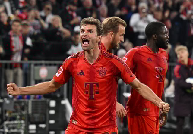 Soccer Football - Bundesliga - Bayern Munich v VfB Stuttgart - Allianz Arena, Munich, Germany - October 19, 2024 Bayern Munich's Thomas Mueller celebrates after Harry Kane scores their first goal REUTERS/Angelika Warmuth/File Photo