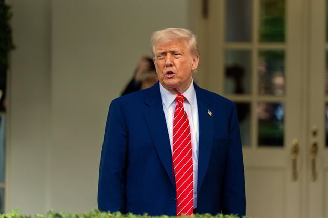 President Donald Trump speaks with reporters in front of the West Wing of the White House, Thursday, May 8, 2025, in Washington. (AP Photo/Alex Brandon)