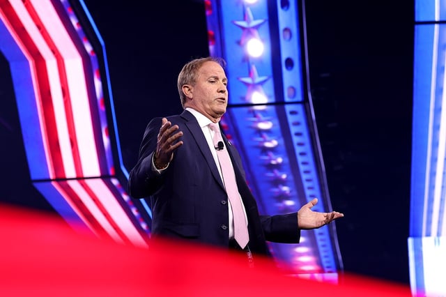 Ken Paxton speaking at an event.