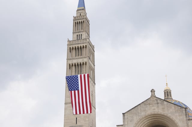 The Basilca of the National Shrine of the Immaculate Conception is seen adorned with an American flag in Washington DC on Thursday, May 8, 2025.