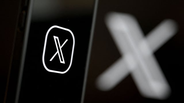 This illustration photograph shows the logo of social network X (formerly Twitter) displayed on a smartphone.