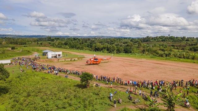 A general view shows a United Nations Humanitarian Air Service (UNHAS) helicopter managed by the World Food Programme (WFP), painted in orange colour as part of efforts to improve safety of operations in the restive eastern Congo at the Mahagi airstrip in Ituri province of the Democratic Republic of Congo in this photograph released on April 20, 2023. World Food Programme/Handout via REUTERS