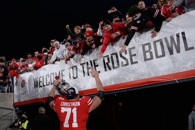 Jan 1, 2022; Pasadena, CA, USA; Ohio State Buckeyes offensive lineman Ben Christman (71) celebrates as he leaves the field after defeating the Utah Utes during the 2022 Rose Bowl college football game at the Rose Bowl. Mandatory Credit: Orlando Ramirez-USA TODAY Sports/File Photo