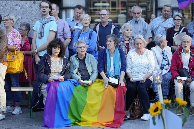 FILE - A public blessing ceremony with hundreds of believers takes place in front of the Cologne Cathedral in Cologne, Germany, on Sept. 20, 2023. (AP Photo/Martin Meissner, File)