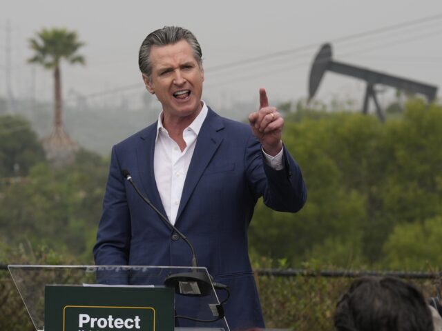 California Gov. Gavin Newsom addresses members of the Campaign for a Safe and Healthy California campaigning for Keep The Law (SB 1137) in Ladera Hills area of Inglewood, Calif., on Friday, March. 22, 2024. California Gov. Gavin Newsom, Arnold Schwarzenegger and Jane Fonda are calling on voters to keep a law banning new oil and gas wells near homes, schools and hospitals as the oil industry fights to overturn it. The campaign is to keep the 2022 law. (AP Photo/Damian Dovarganes)