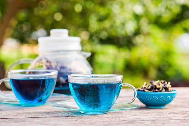 The flower petals of the butterfly pea flower plant provide a vibrant blue hue to foods and beverages.