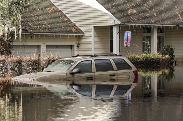 FILE - A neighborhood still flooded from Hurricane Milton prepares to have the FEMA Disaster Recover Center covert to a polling location for the general election on Monday, Nov. 4, 2024, in Ridge Manor, Fla. (AP Photo/Mike Carlson, File)