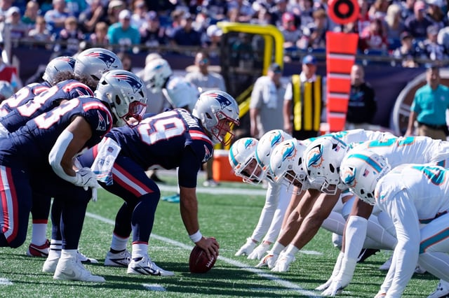 New England Patriots long snapper Joe Cardona (49) during the first half of an NFL football game, Sunday, Oct. 6, 2024, in Foxborough, Mass. (AP Photo/Michael Dwyer)