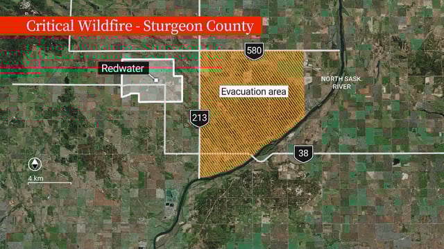 The weather has provided some relief to firefighters battling a blaze north of Edmonton that forced the evacuation of 56 homes, but in an update on Friday morning, fire officials said it is still burning out of control.