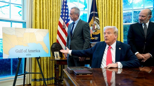 President Trump, flanked by Robert F Kennedy Jr and Howard Lutnick, announced plans to rename the body of water in January
