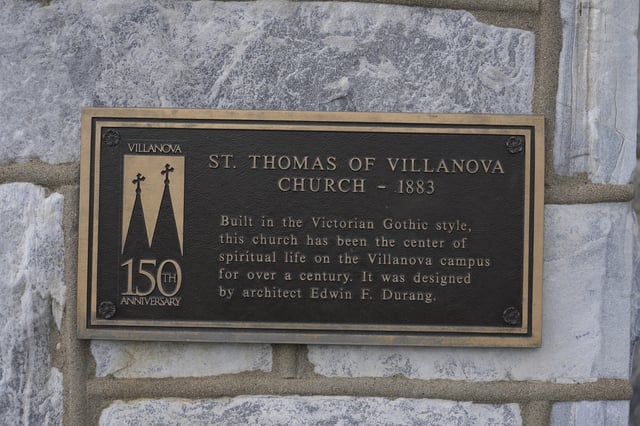 An informational sign is displayed on St. Thomas of Villanova Church on the Villanova University campus Thursday, May 8, 2025 in Villanova, Pa. (AP Photo/Matt Slocum)