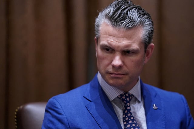 U.S. Secretary of Defense Pete Hegseth attends a cabinet meeting at the White House in Washington, D.C., U.S., April 10, 2025. REUTERS/Nathan Howard/File Photo