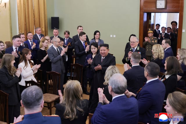 A handout photo shows North Korean leader Kim Jong Un attending an event to celebrate Russia's Victory Day, at the Russian embassy in Pyongyang, North Korea May 9, 2025. KCNA via REUTERS