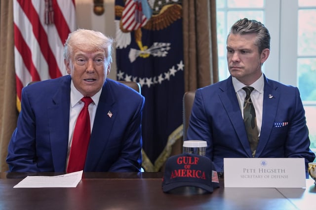 President Donald Trump speaks during a cabinet meeting at the White House, Wednesday, April 30, 2025, in Washington, as Secretary of Defense Pete Hegseth looks on.