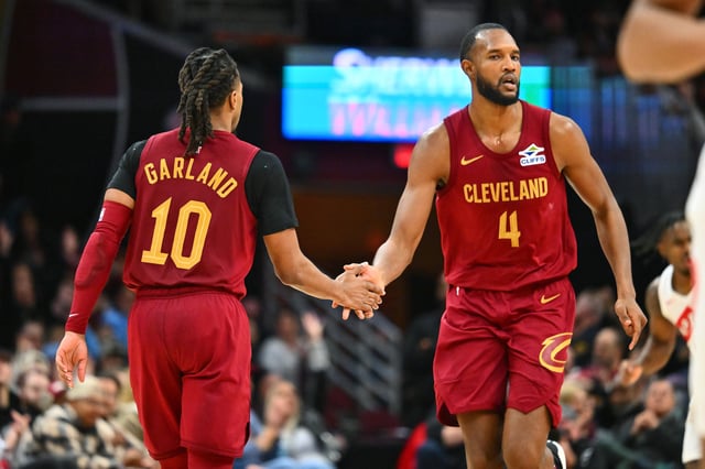 CLEVELAND, OHIO - JANUARY 09: Darius Garland #10 celebrates with Evan Mobley #4 of the Cleveland Cavaliers during the fourth quarter at Rocket Mortgage Fieldhouse on January 09, 2025 in Cleveland, Ohio.