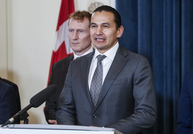 Federal Immigration, Refugees and Citizenship Minister Marc Miller, left, listens as Manitoba Premier Wab Kinew speaks about Manitoba welcoming a Palestinian mother and her son from Gaza to Winnipeg, at the Manitoba Legislature Thursday, January 16, 2025. A second boy from Gaza arrived Friday, May 9, 2025. THE CANADIAN PRESS/John Woods