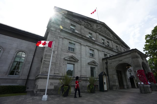Ceremonial Guards from the Canadian Grenadier Guards (CGG) regiment perform Sentry Duties at Rideau Hall, the residence of the Governor General of Canada in Ottawa on Friday, July 7, 2023. (Sean Kilpatrick/The Canadian Press)