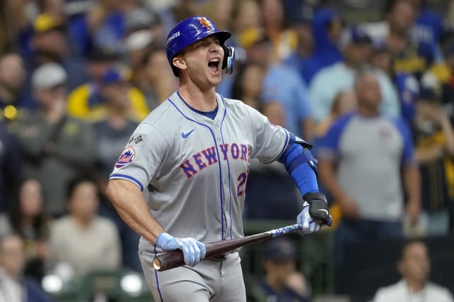 MILWAUKEE, WISCONSIN - OCTOBER 03: Pete Alonso #20 of the New York Mets celebrates after hitting a home run in the ninth inning against the Milwaukee Brewers during Game Three of the Wild Card Series at American Family Field on October 03, 2024 in Milwaukee, Wisconsin.