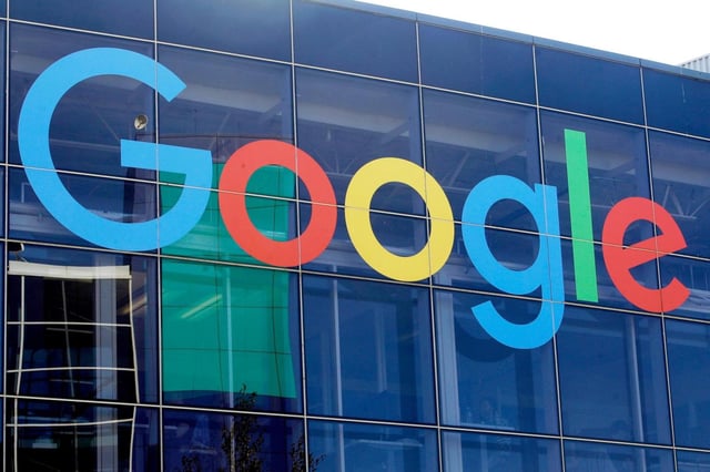 FILE – A sign is displayed on a Google building at their campus in Mountain View, Calif., on Sept. 24, 2019. (AP Photo/Jeff Chiu, File)