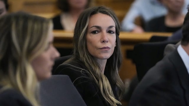 In her ongoing trial for the murder of boyfriend John O’Keefe, Karen Read faced scrutiny after a video emerged showing her potentially raising her middle finger in court. (AP Photo/Charles Krupa, Pool) 