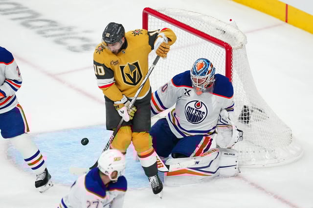 May 6, 2025; Las Vegas, Nevada, USA; Vegas Golden Knights center Nicolas Roy (10) attempts to deflect the puck towards Edmonton Oilers goaltender Calvin Pickard (30) during the third period of  game one of the second round of the 2025 Stanley Cup Playoffs at T-Mobile Arena. Stephen R. Sylvanie-Imagn Images/File Photo