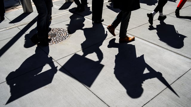 People attend a rally in support of federal workers outside the 26 Federal Plaza, a federal office building in New York City, U.S., March 25, 2025. REUTERS/Eduardo Munoz/File Photo