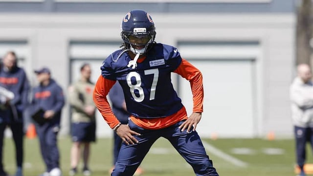 Chicago Bears wide receiver Burden III warms up during the Rookie Minicamp at Halas Hall.