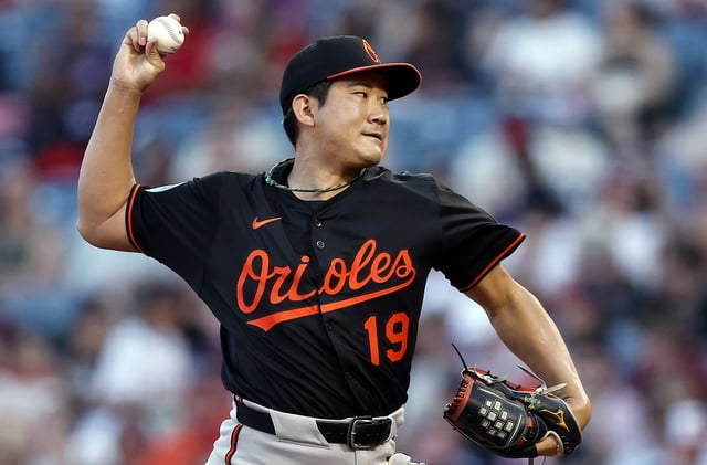 Baltimore Orioles starting pitcher Tomoyuki Sugano throws to the plate during the second inning of their game against the Angels on Friday night at Angel Stadium. (Photo by Ronald Martinez/Getty Images)
