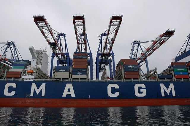 A container ship sits docked at the Port of Los Angeles on May 6, 2025, in San Pedro, California. Los Angeles and Long Beach ports are seeing significant drops in expected cargo ships coming into port this week due to tariffs imposed by the Trump Administration.
