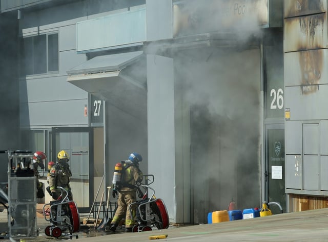 A lithium battery might have started the fire, the warehouse owner said
