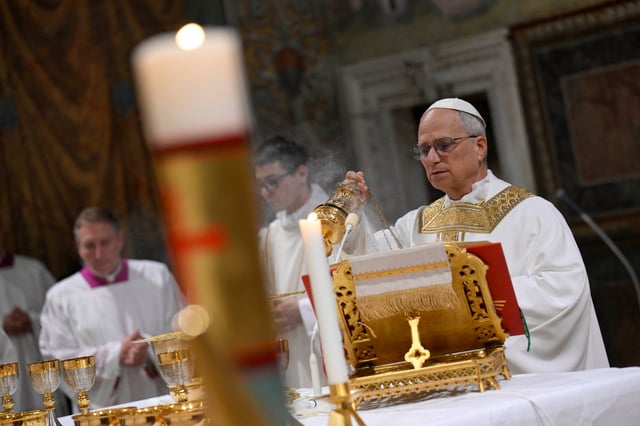Pope Leo XIV conducts Mass in the Sistine Chapel at the Vatican, May 9, 2025. Vatican Media/Handout via REUTERS