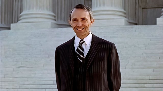 After being presented to the public by Chief Justice William Rehnquist, then-Associate Justice of the Supreme Court David Souter poses during the traditional photo opportunity on the front plaza of the Courthouse in Washington DC, October 9, 1990.
