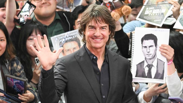 Tom Cruise poses for a photo during a red carpet event for the film Mission: Impossible The Final Reckoning in Seoul. (Photo by Jung Yeon-je / AFP)