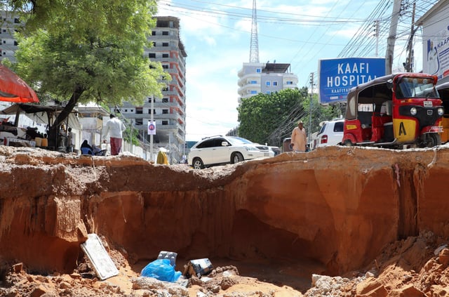 A general view shows a road destroyed after overnight rains caused damage to houses and infrastructure, in Wadajir district of Mogadishu, Somalia May 10, 2025. REUTERS/Feisal Omar