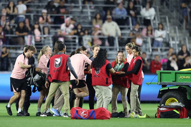 Medical staff attended to Savy King for about 10 minutes before she was stretchered off the field.