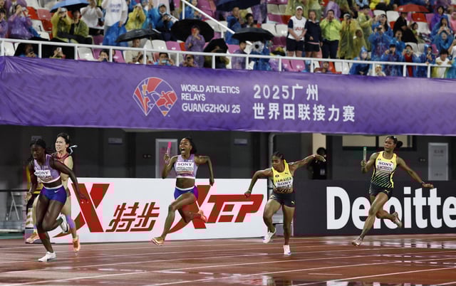 Athletics - World Athletics Relays 2025 - Guangdong Olympic Stadium, Guangzhou, China - May 10, 2025 Jamaica's Natasha Morrison and Krystal Sloley, Britain's Nia Wedderburn-Goodison and Kissiwaa Mensah in action during the mixed 4x100 metres relay - heat 2 REUTERS/Tingshu Wang