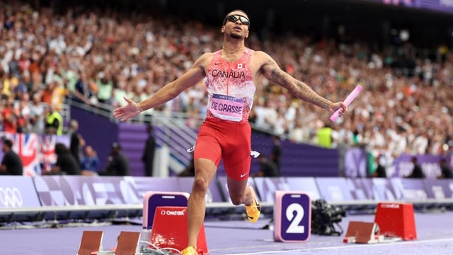 Andre De Grasse, shown in this file photo, helped secure his men's 4x100-metre relay team a second-place finish at the World Athletics Relays on Saturday in Guangzhou, China. That result clinched a spot for Canada at the World Athletics Championships in Tokyo in September.