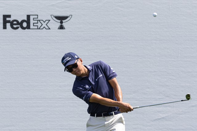 May 8, 2025; Philadelphia, Pennsylvania, USA; Michael Kim plays a shot on the 16th hole during the first round of the Truist Championship golf tournament. Mandatory Credit: Bill Streicher-Imagn Images