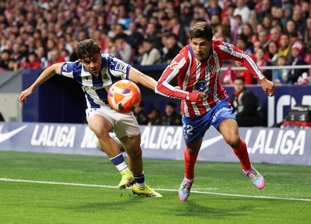 Soccer Football - LaLiga - Atletico Madrid v Real Sociedad - Metropolitano, Madrid, Spain - May 10, 2025 Atletico Madrid's Giuliano Simeone in action with Real Sociedad's Jon Aramburu REUTERS/Violeta Santos Moura