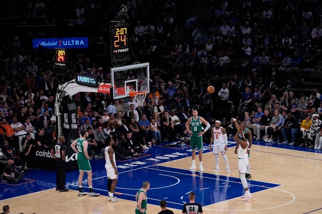 New York Knicks&#39; Mitchell Robinson shoots a free throw during the second half of Game 3 of an NBA basketball second-round playoff series against the Boston Celtics, Saturday, May 10, 2025, in New York. (AP Photo/Pamela Smith)