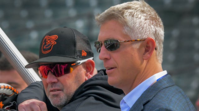 Baltimore Orioles manager Brandon Hyde speaks with Mike Elias, executive vice president and general manager for the ballclub during Game 2 of the American League Division Series at Oriole Park at Camden Yards on Oct. 8, 2023. (Karl Merton Ferron/Staff)