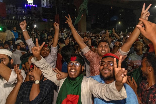 People celebrate after the interim government officially banned all the activities of the Bangladesh Awami League, until the trial of the party and its leader, following the demand of the protesters, in Dhaka, Bangladesh, May 10, 2025. REUTERS/Abdul Goni