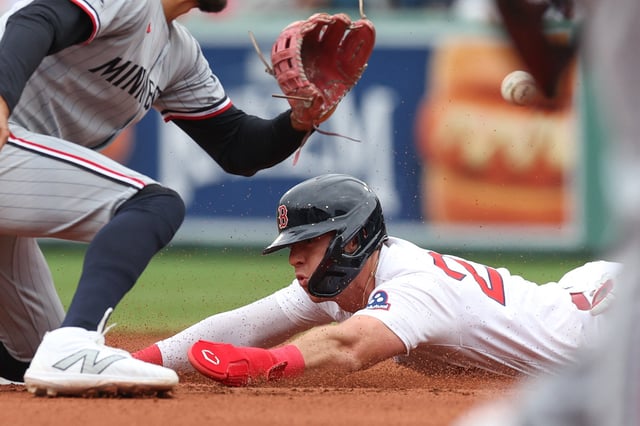 May 4, 2025; Boston, Massachusetts, USA; Boston Red Sox first baseman Romy Gonzalez (23) steals second base during the sixth inning against the Minnesota Twins at Fenway Park. Paul Rutherford-Imagn Images/File Photo