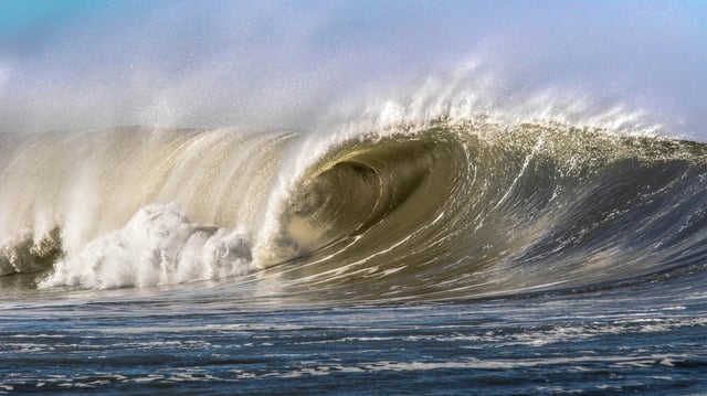 Ocean waves crashing into each other.
