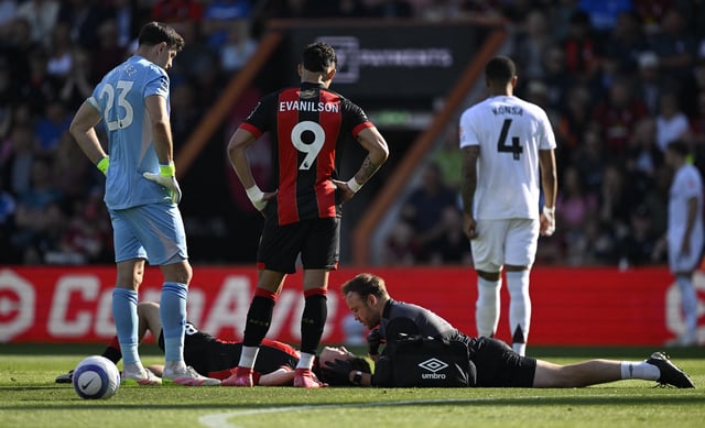 Soccer Football - Premier League - AFC Bournemouth v Aston Villa - Vitality Stadium, Bournemouth, Britain - May 10, 2025 AFC Bournemouth's Alex Scott receives medical attention after sustaining an injury REUTERS/Tony O Brien