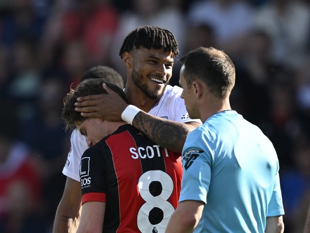 Soccer Football - Premier League - AFC Bournemouth v Aston Villa - Vitality Stadium, Bournemouth, Britain - May 10, 2025 Aston Villa's Tyrone Mings and AFC Bournemouth's Alex Scott REUTERS/Tony O Brien