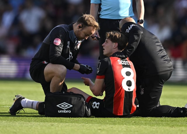 Soccer Football - Premier League - AFC Bournemouth v Aston Villa - Vitality Stadium, Bournemouth, Britain - May 10, 2025 AFC Bournemouth's Alex Scott receives medical attention after sustaining an injury REUTERS/Tony O Brien