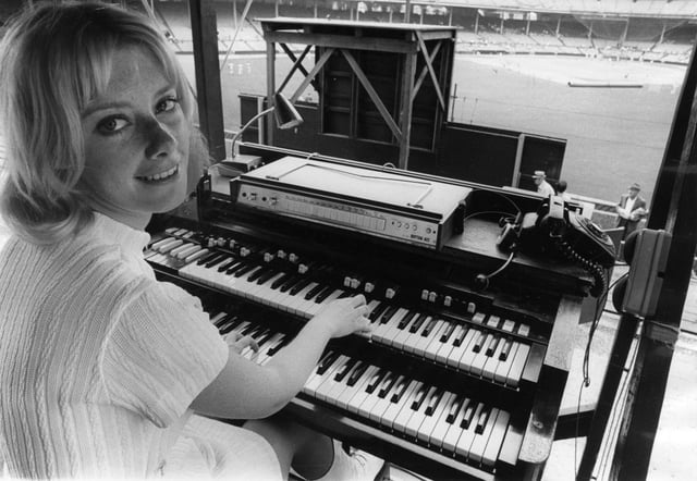The White Sox organist at her position in center field in 1971. The telephone is her hotline to the Comiskey Park electrician should the organ begin wheezing. (Bob Fila/Chicago Today)