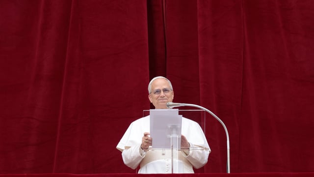 Pope Leo XIV leads a Regina Caeli prayer from the central balcony (Loggia delle Benedizioni) of St. Peter's Basilica, at the Vatican, May 11, 2025. 